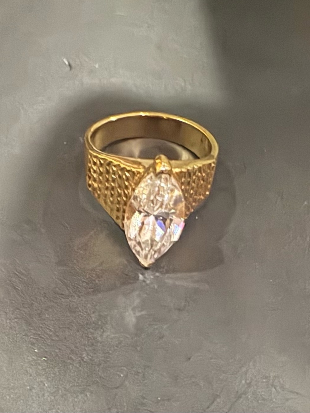 Gold plated sterling silver ring with Marquise  cubic zirconia Center stone